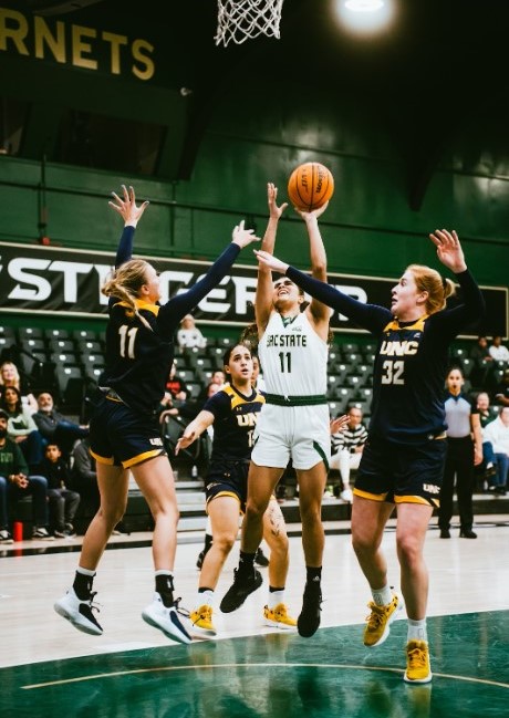 Freshman Akaysha Muggeridge muscles up a shot against Northern Colorado. Muggeridge and the rest of the Sac State women's basketball team enjoyed the best season in the program's history, including a trip to the NCAA Div. 1 tournament. 