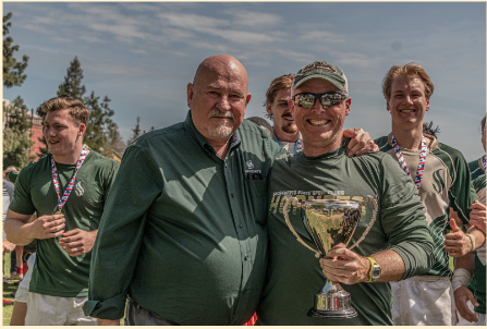 Sac State president Rober Nelsen and men's rugby coach Steve Seifert hold the California Cup after the Hornets defeated Fresno State 42-27. 